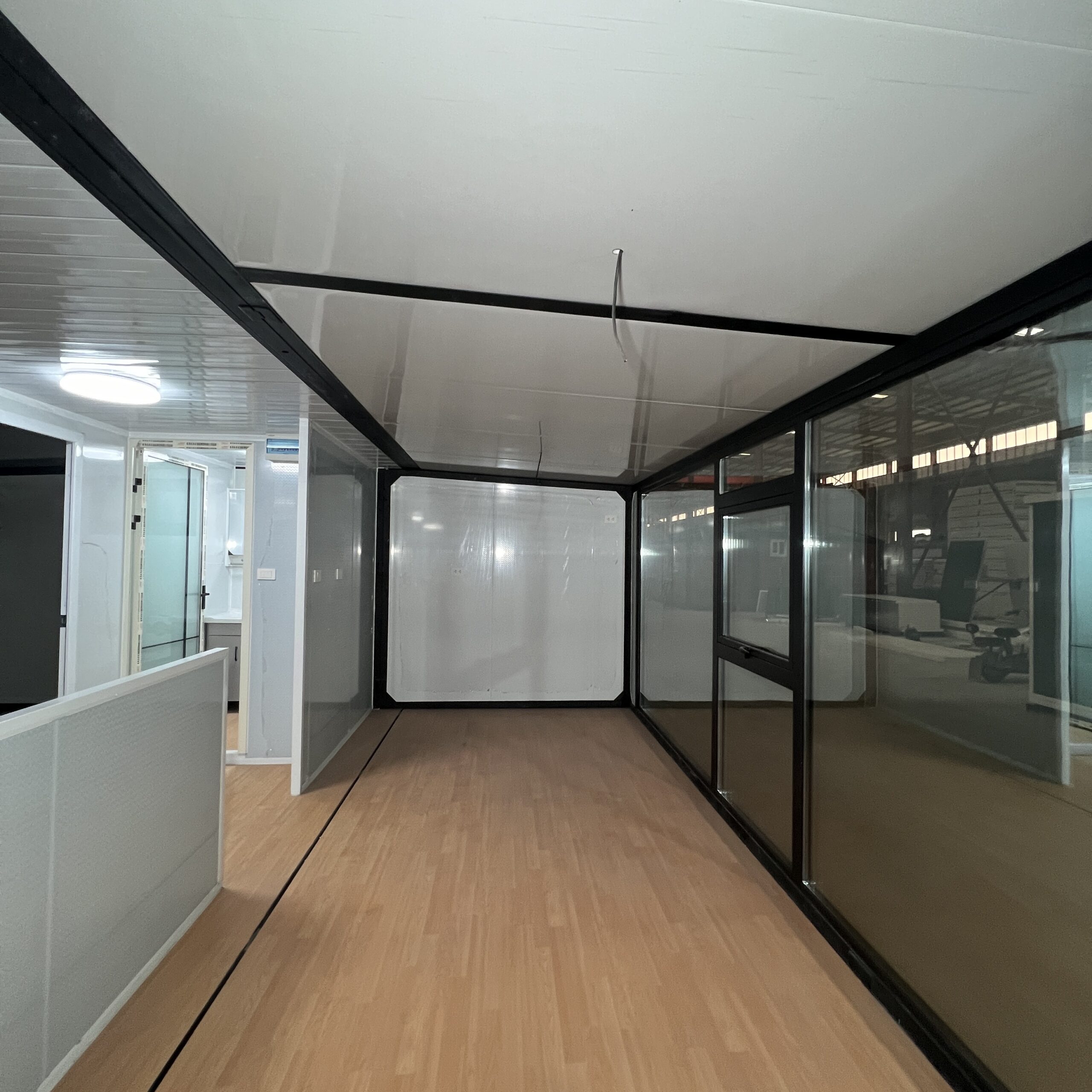 Expandable 4 Bedroom Container House Large Room With Black Frame And White Wall Panels - Image 5