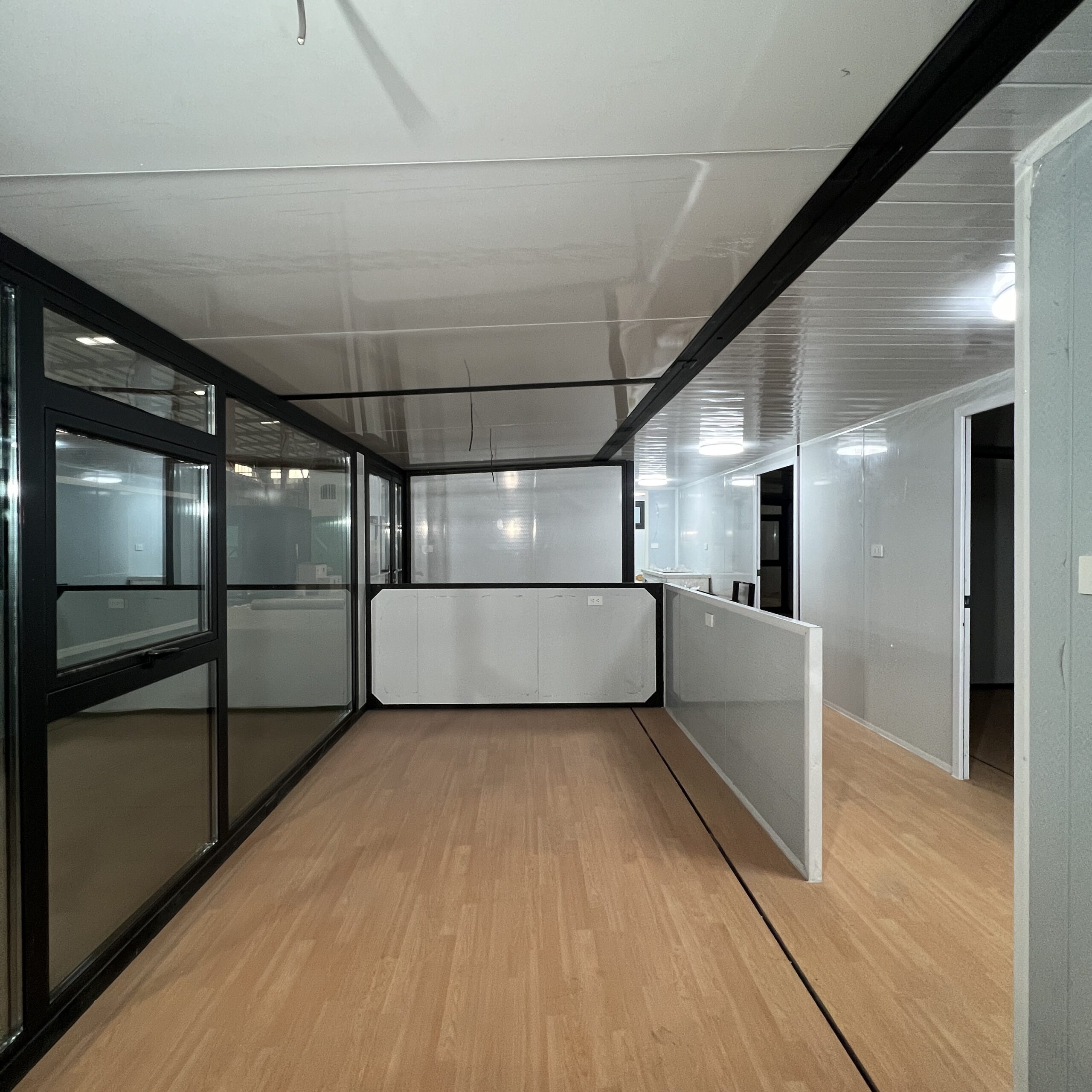 Expandable 4 Bedroom Container House Large Room With Black Frame And White Wall Panels - Image 7