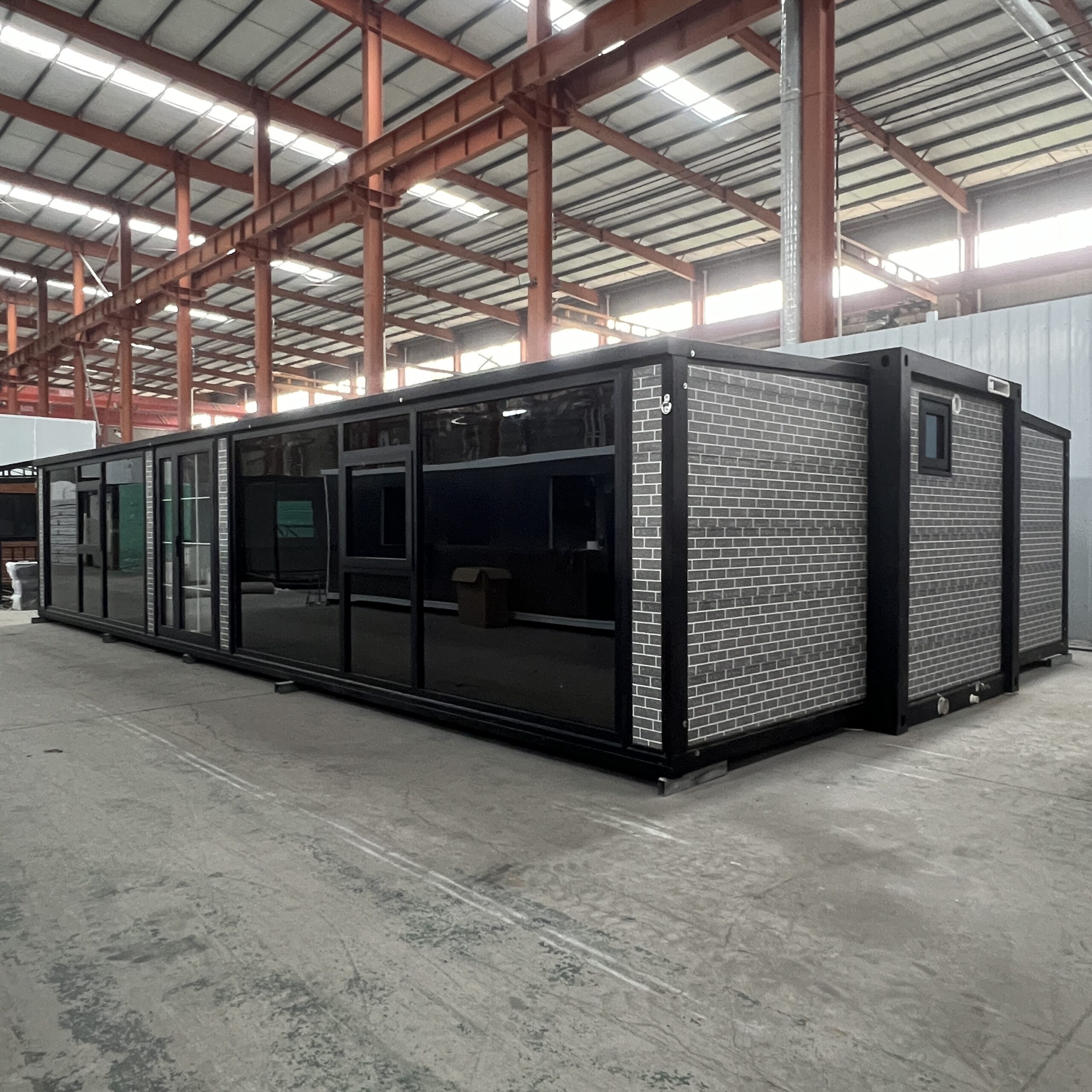 Expandable 4 Bedroom Container House Large Room With Black Frame And White Wall Panels - Image 2