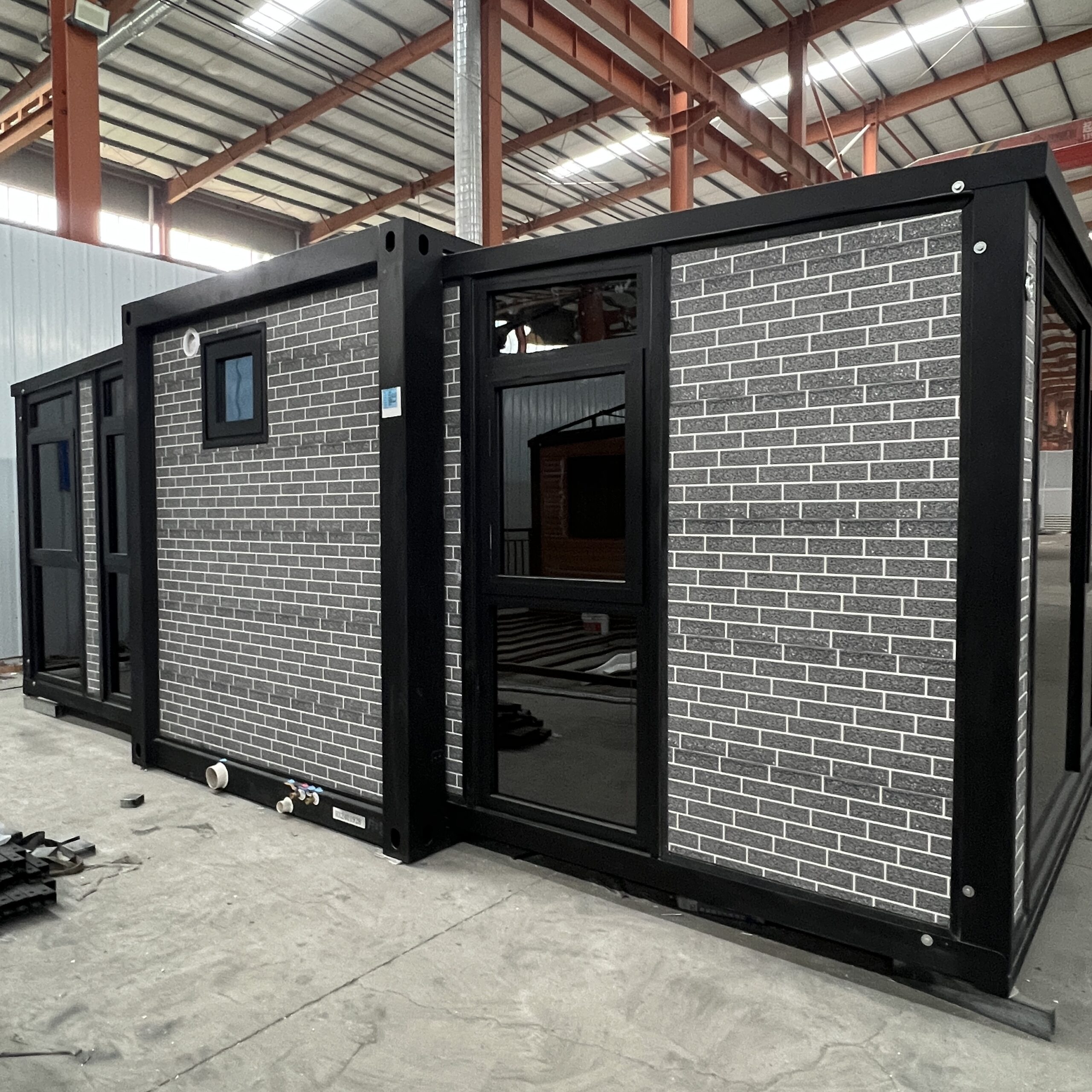 Expandable 4 Bedroom Container House Large Room With Black Frame And White Wall Panels - Image 3